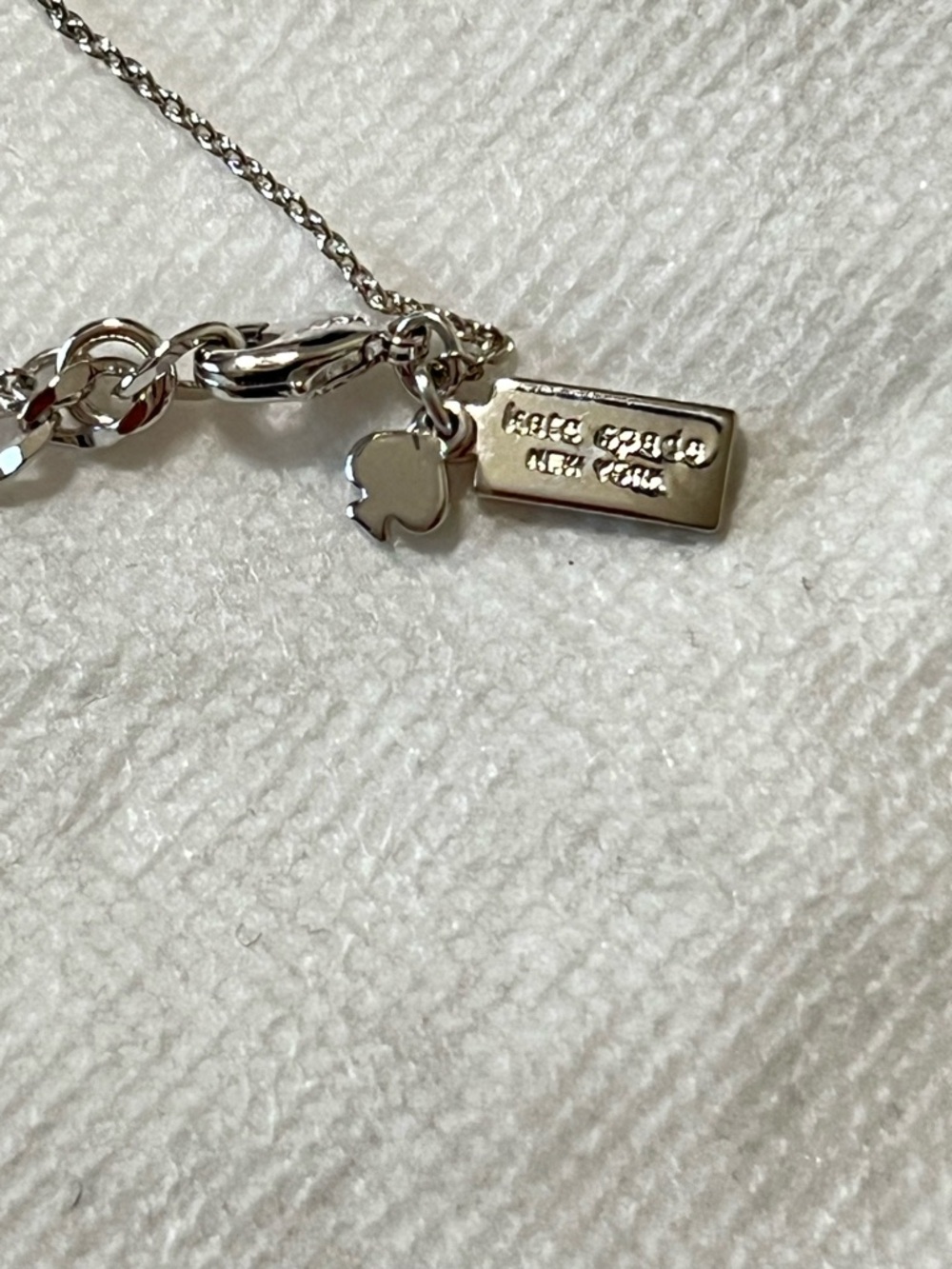 kate spade Silver-Tone Logo Tag Necklace with Spade Charm - Picture 3 of 7